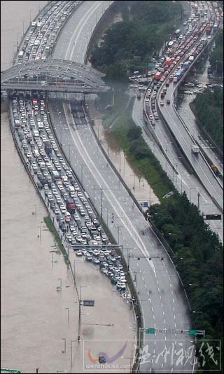 韩国百年一遇暴雨伤亡惨重 城市化进程加快