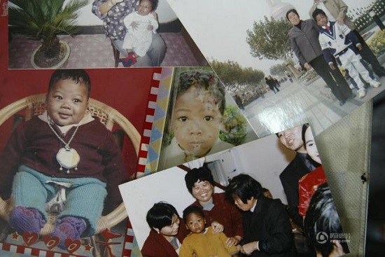 上海老太收养黑人弃婴 14年后终于上了户口